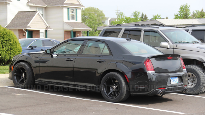 Illustration for article titled What The Hell Is This Widebody Chrysler 300 SRT With Dodge Demon Wheels?